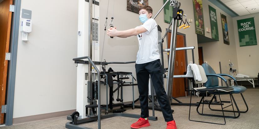 Joey in physical therapy at Allied Services