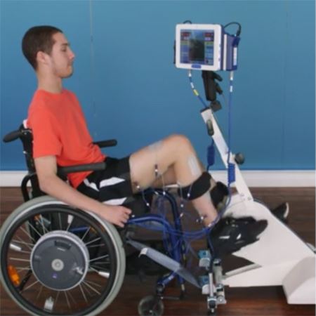 Man in wheelchair using the Leg Cycle
