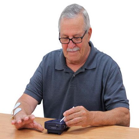 Man using the equipment on his hand