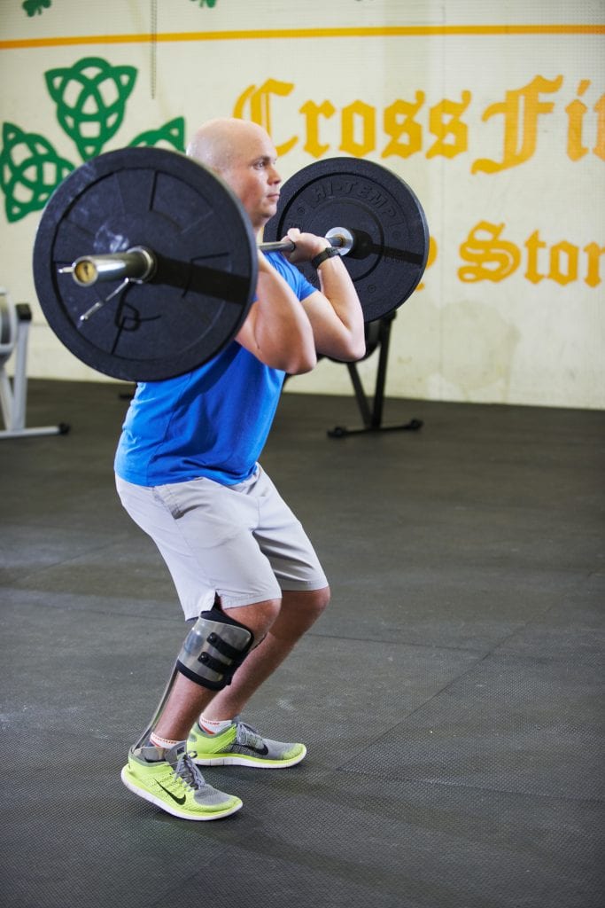 Trooper Alex lifting weights.